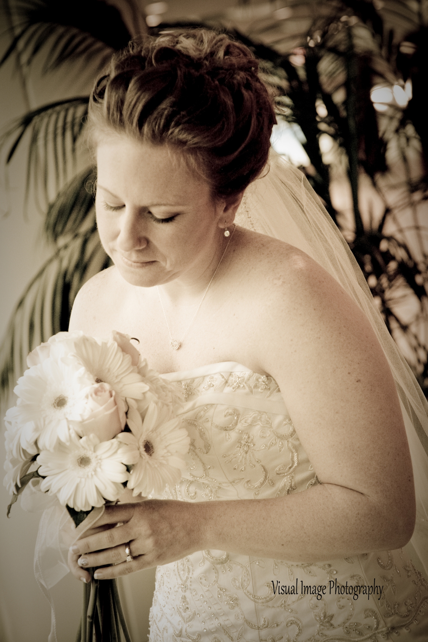 Jen looking at bouquet.jpg